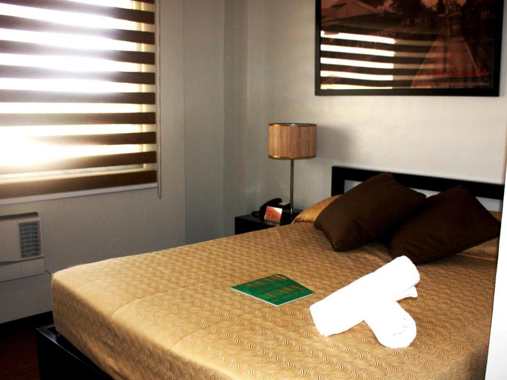 L Square Hotel Tarlac City Bilik gambar